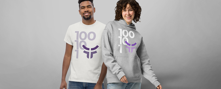Man looking at the ground wearing Fearless purple zip up hoodie