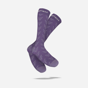 purple fearless socks with purple cow logo all over them