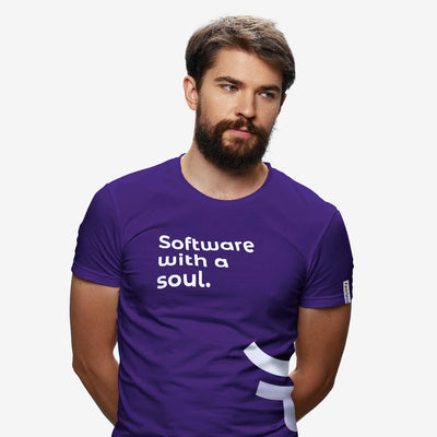 man wearing purple fearless shirt that says software with a soul