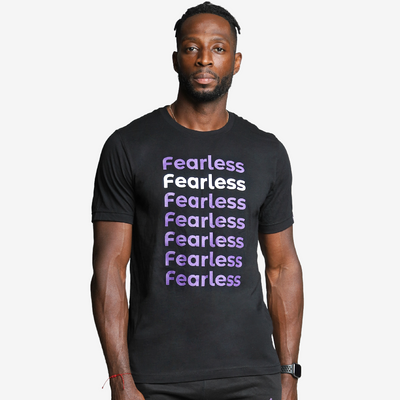 man wearing black and purple fearless shirt